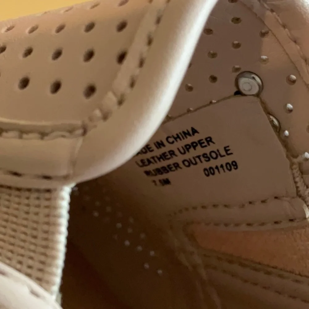 Micheal Micheal Kors woman’s pink perforated sneaker